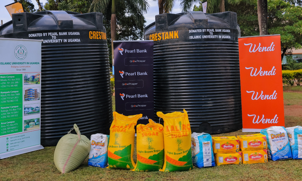 pearl-bank-uganda-extends-ramadhan-support-to-islamic-university-in-uganda-with-water-tanks-and-food-aid